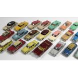 Thirty two various Dinky scale model cars including “Plymouth Fury” (No. 137); & “Cadillac Eldorado”
