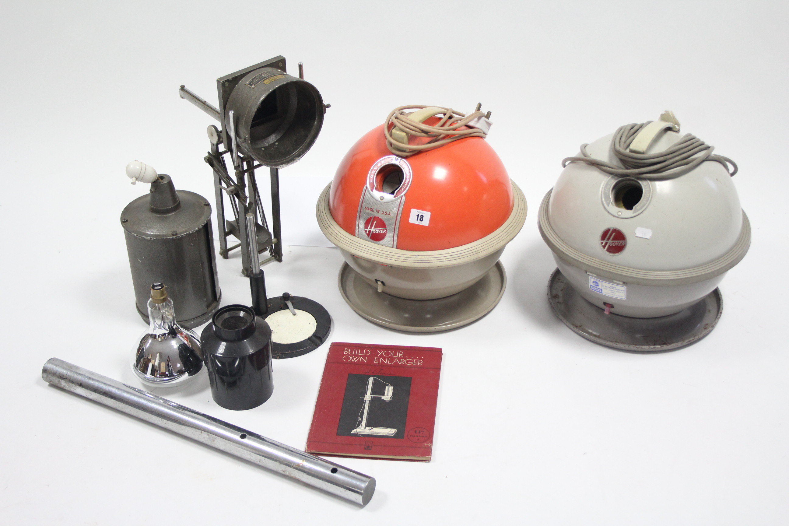 Two Hoover Constellation vacuum cleaners; a darkroom enlarger; and a small quantity of household