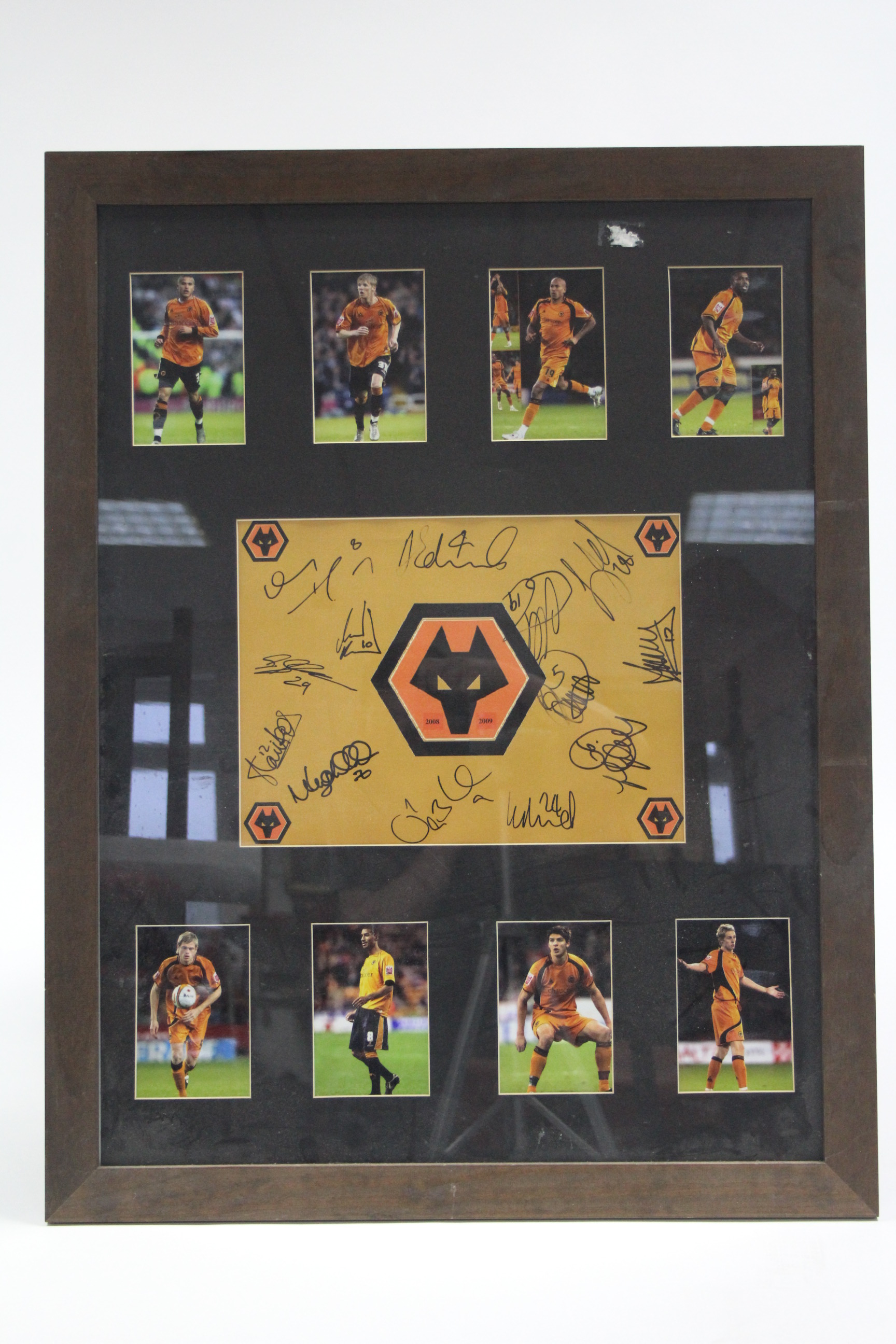 A framed Wolverhampton Wanderers Football Club display autographed by some of the players from the