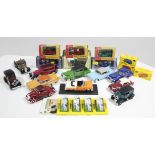 Twenty two various scale models by Corgi, Matchbox, & others, each with original packaging