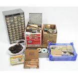 Various model railway builder’s accessories including sleepers, wheels, levers, etc