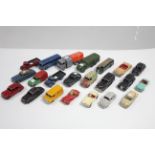 Twenty two various Dinky scale model vehicles, all un-boxed