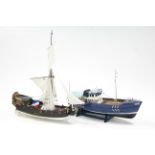 A painted wooden model of the trawler “Nordkap”, 323” long; & a painted wooden model of a galleon,