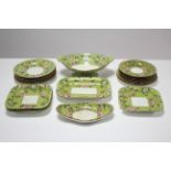 A Spodes porcelain nineteen-piece part dessert service of pale green ground & with all-over