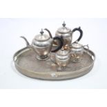 An Indian electro plated four piece tea & coffee service; & an engraved silver plated oval two-