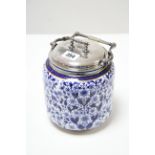 A Royal Crown Derby blue & white “Derby Lily” pattern biscuit barrel with plated cover, 7¼” high.