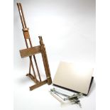 An artist’s wooden fold-away studio easel; an artist’s portable easel; & a Techostyl “642” drawing