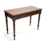 A Victorian mahogany side table fitted frieze drawer with brass knob handles, & on turned tapered