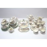 A Spodes “Chinese Rose” pattern fifty five piece part dinner, tea, & coffee service.
