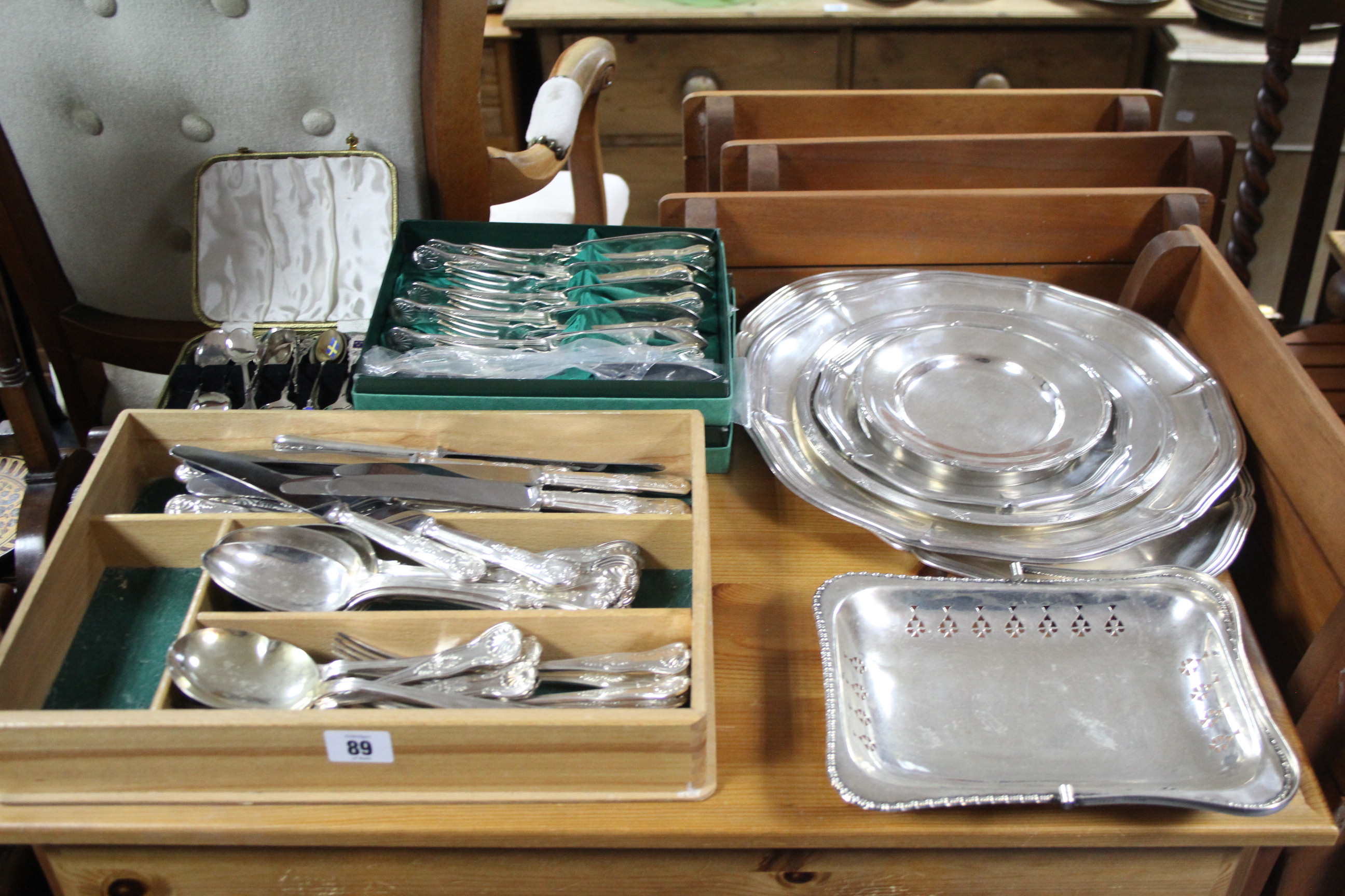 Various items of platedware and cutlery.