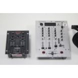 A Behringer "Professional 3-Channel” DJ mixer with BPM counter; a Gemini preamp mixer; and a