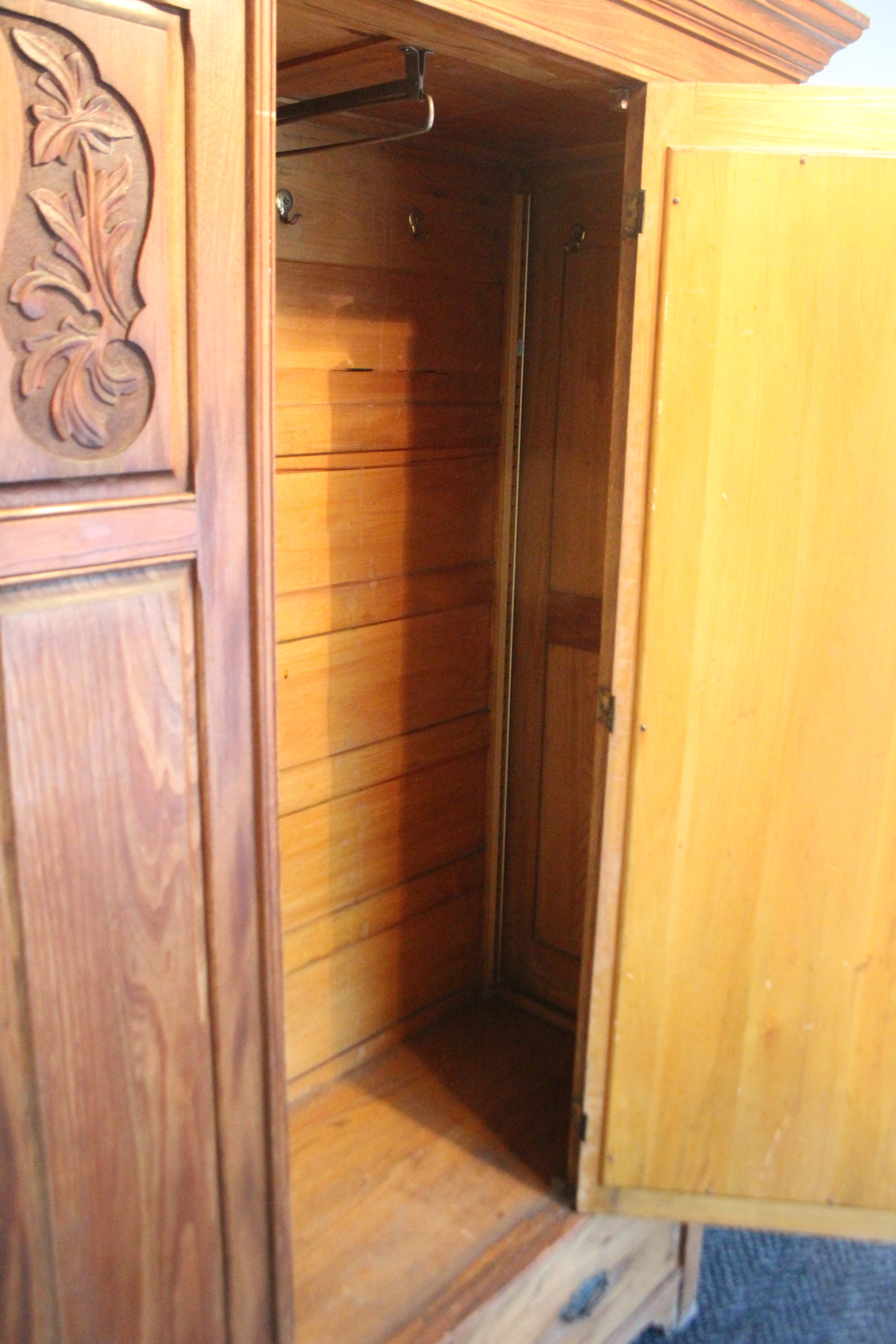 A late Victorian walnut wardrobe, enclosed by rectangular bevelled mirror door to centre flanked - Image 2 of 2