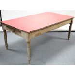 A VICTORIAN PINE KITCHEN TABLE (with later red laminate to the rectangular top), fitted end drawer &