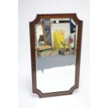 A late 19th/early 20th century mahogany frame rectangular wall mirror with beaded edge & inset
