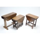 Three oak drop-leaf occasional tables.