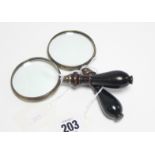 Two modern 2” diam. magnifying glasses,