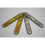 Four reproduction painted cast-iron signs “SHELL MOTOR SPIRIT SOLD HERE”, 11¼” x 2”.