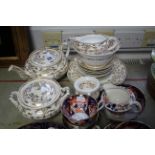 A late Victorian china eighteen-piece part tea service of white ground & with gold scroll design;