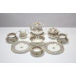 A Rockingham-style seventeen-piece part tea service of ivory & lilac ground & with gold foliate