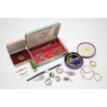 A 15ct. gold bangle; various items of costume jewellery; & a ladies’ wristwatch.