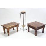 A teak square low coffee table on short turned legs; a rectangular coffee table; & a two-tier