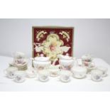 Thirty items of Royal Crown Derby “Derby Posies” pattern tea & coffee ware, with contemporary box.