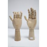 Two modern wooden artist’s hand models, 11½” long.