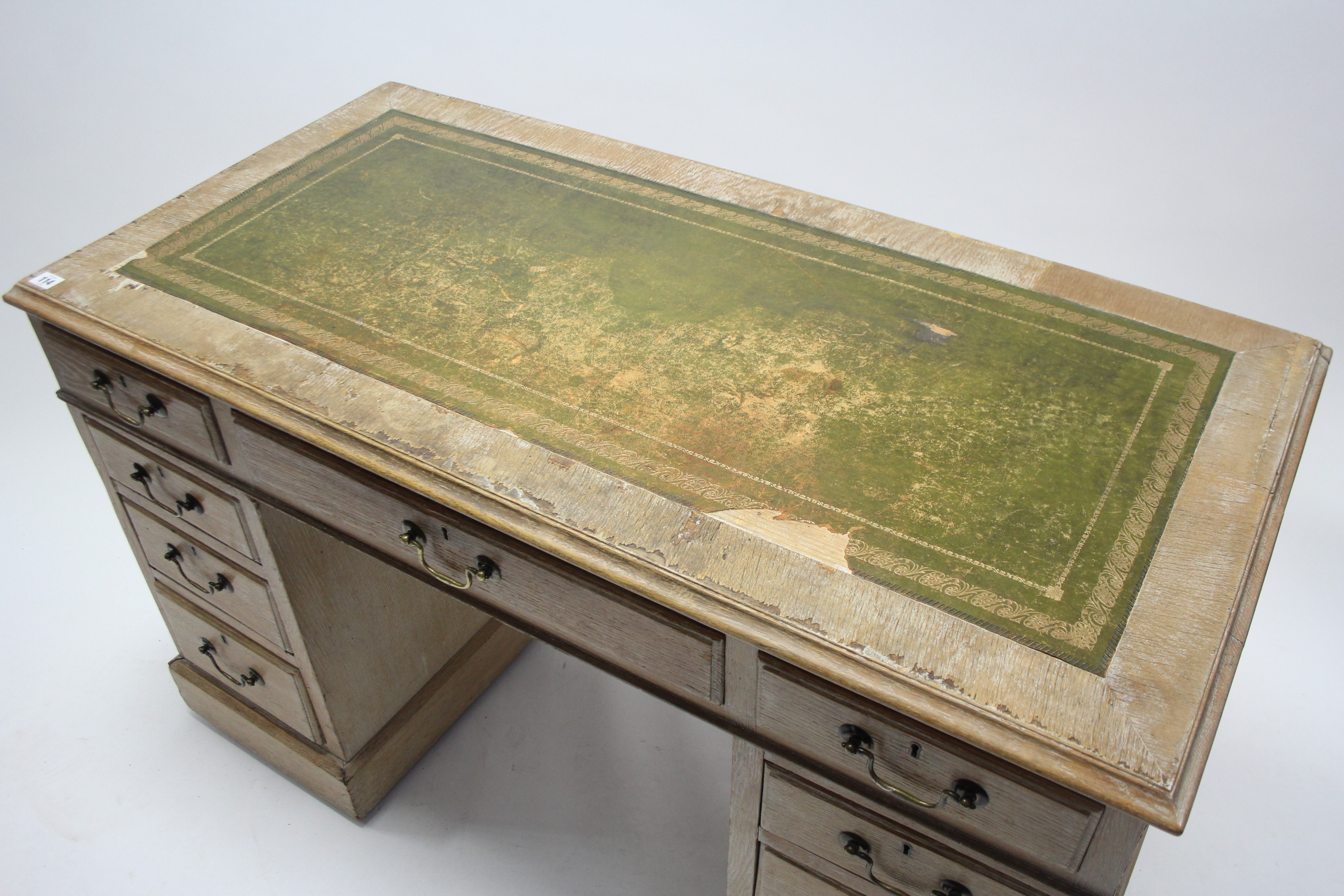 A Victorian limed oak pedestal desk inset gilt-tooled green leather-cloth, fitted with an - Bild 2 aus 4