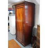 A Victorian mahogany wardrobe enclosed by panel door, & on plinth base, 36” wide x 77” high.