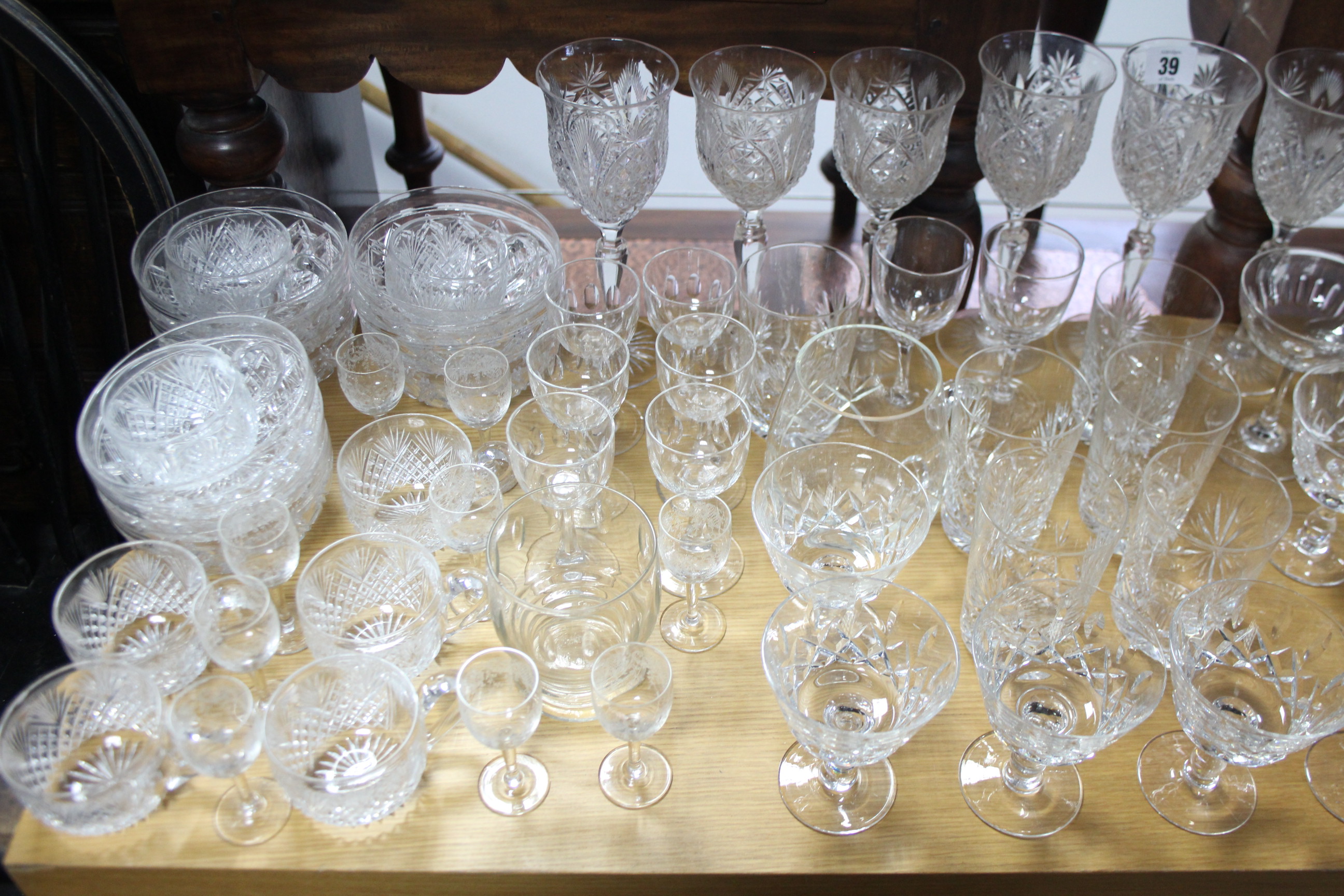 A set of eight heavy cut-glass white wine glasses; a set of nine heavy cut-glass finger bowls; and - Image 2 of 2