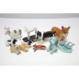 Eleven various Beswick animal ornaments.