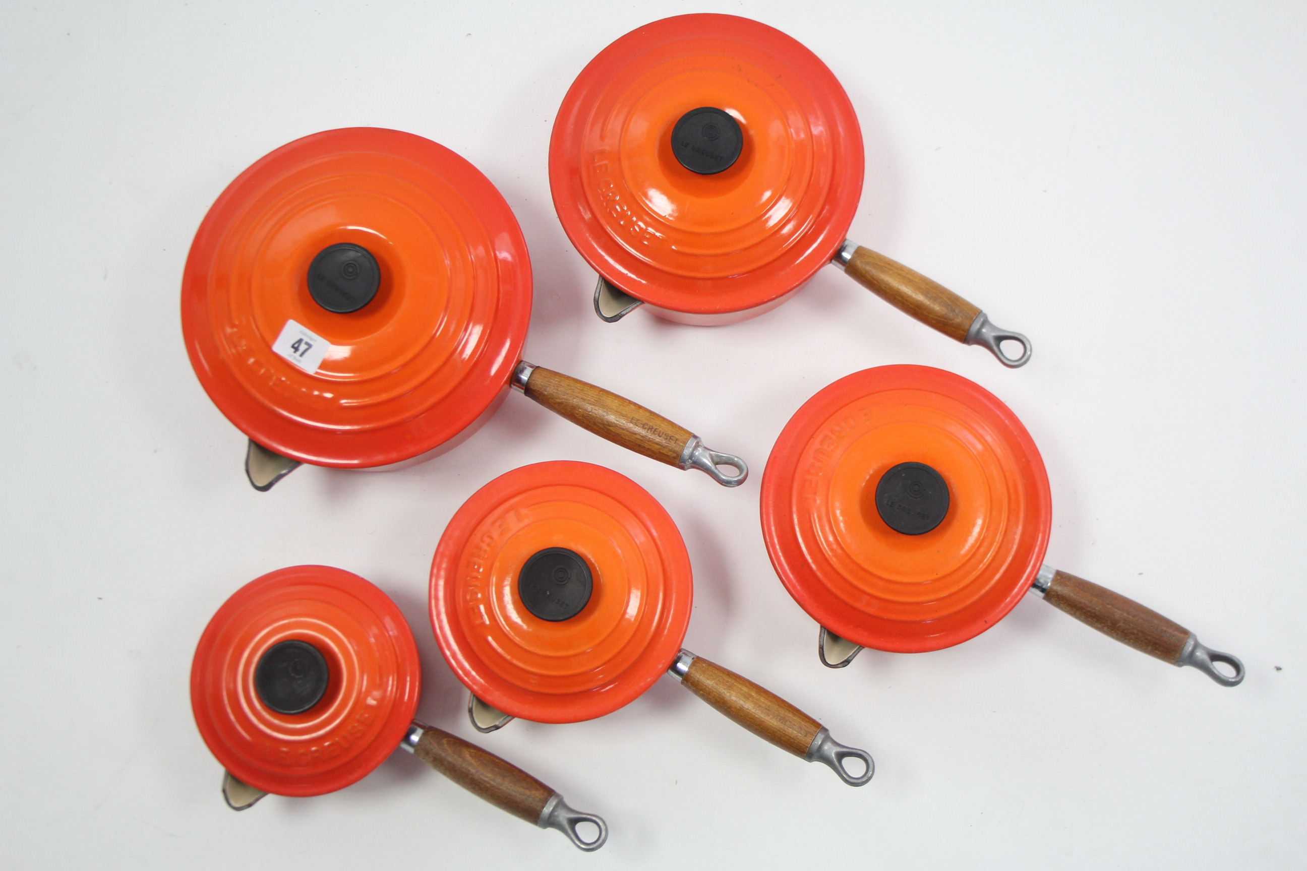 A set of five Le Creuset orange enamelled graduated saucepans, 5¼" - 8¼" diam. - Image 3 of 3