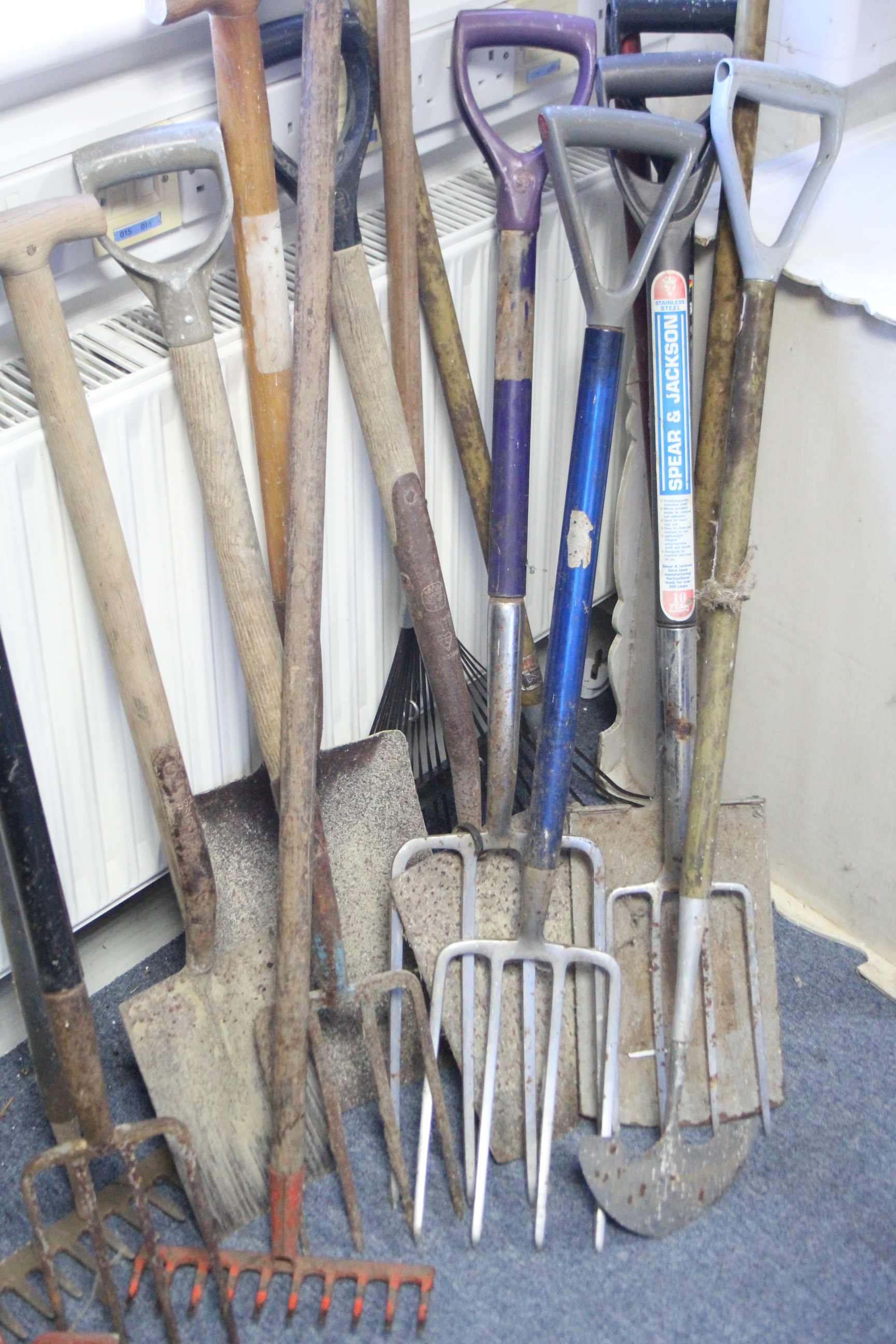 A Beldray aluminium folding step ladder; and various garden tools.