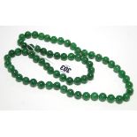 A modern Jade necklace, 32” long.