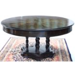 A 19th century ANGLO-INDIAN COROMANDEL VENEERED DRUM-TOP CENTRE TABLE, the radially veneered top