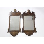 A pair of George III-style mahogany fret-carved rectangular wall mirrors with scallop-shell