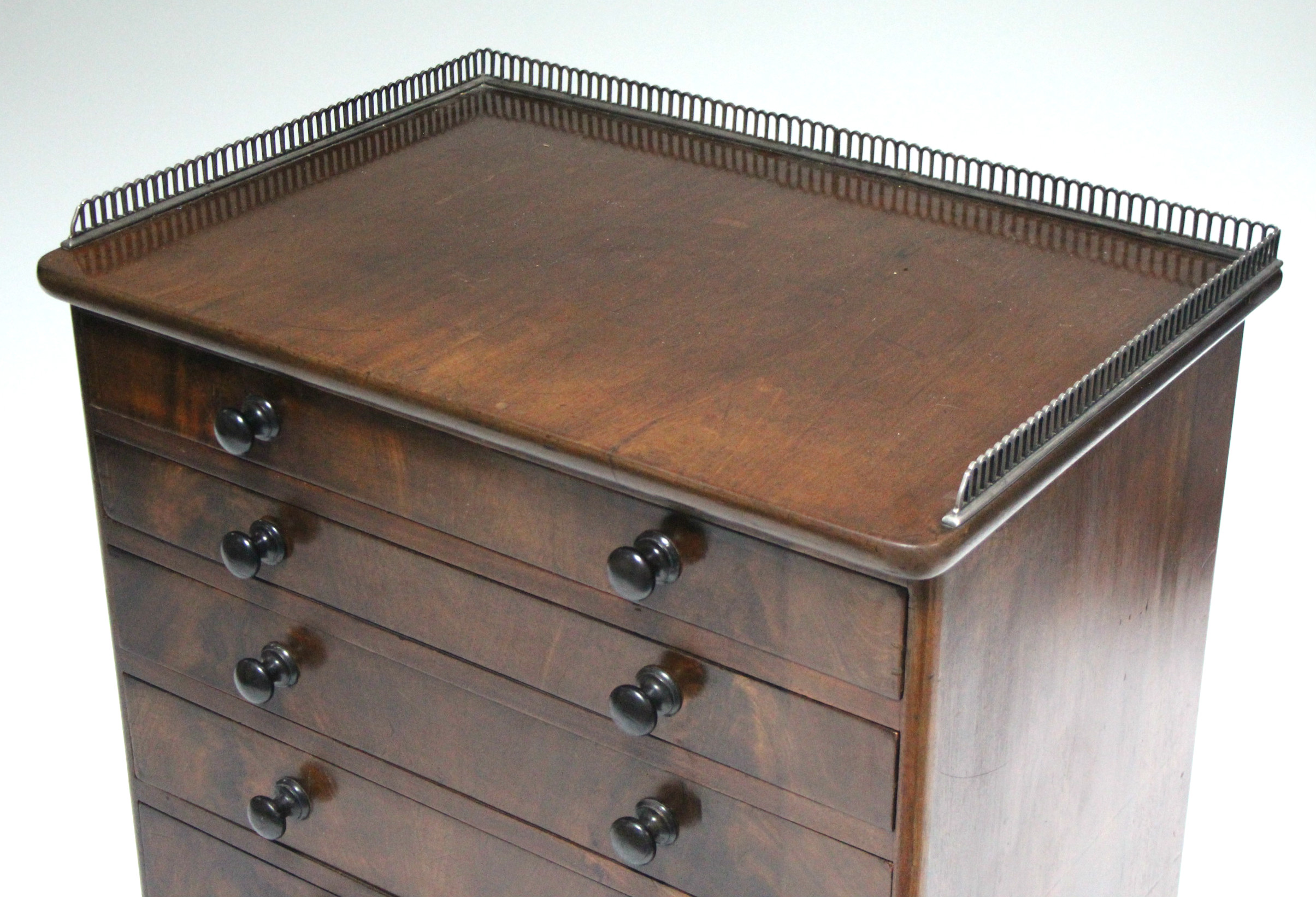 A mid-Victorian mahogany chest of six long graduated drawers with turned knob handles, the top - Image 3 of 10