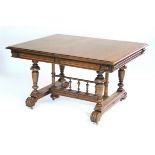 A late Victorian walnut extending dining table, the rectangular top with moulded edge & pull-out