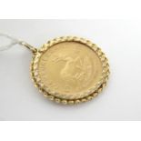 A South African 1980 quarter-Krugerrand, loose-mounted as a pendant with 9ct. gold narrow border.