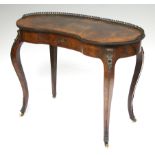 A mid-19th century burr-walnut kidney-shaped dressing table in the Louis XVI style, the