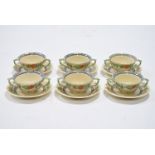 A set of six Mason’s Patent Ironstone China two-handled soup bowls & saucers with floral