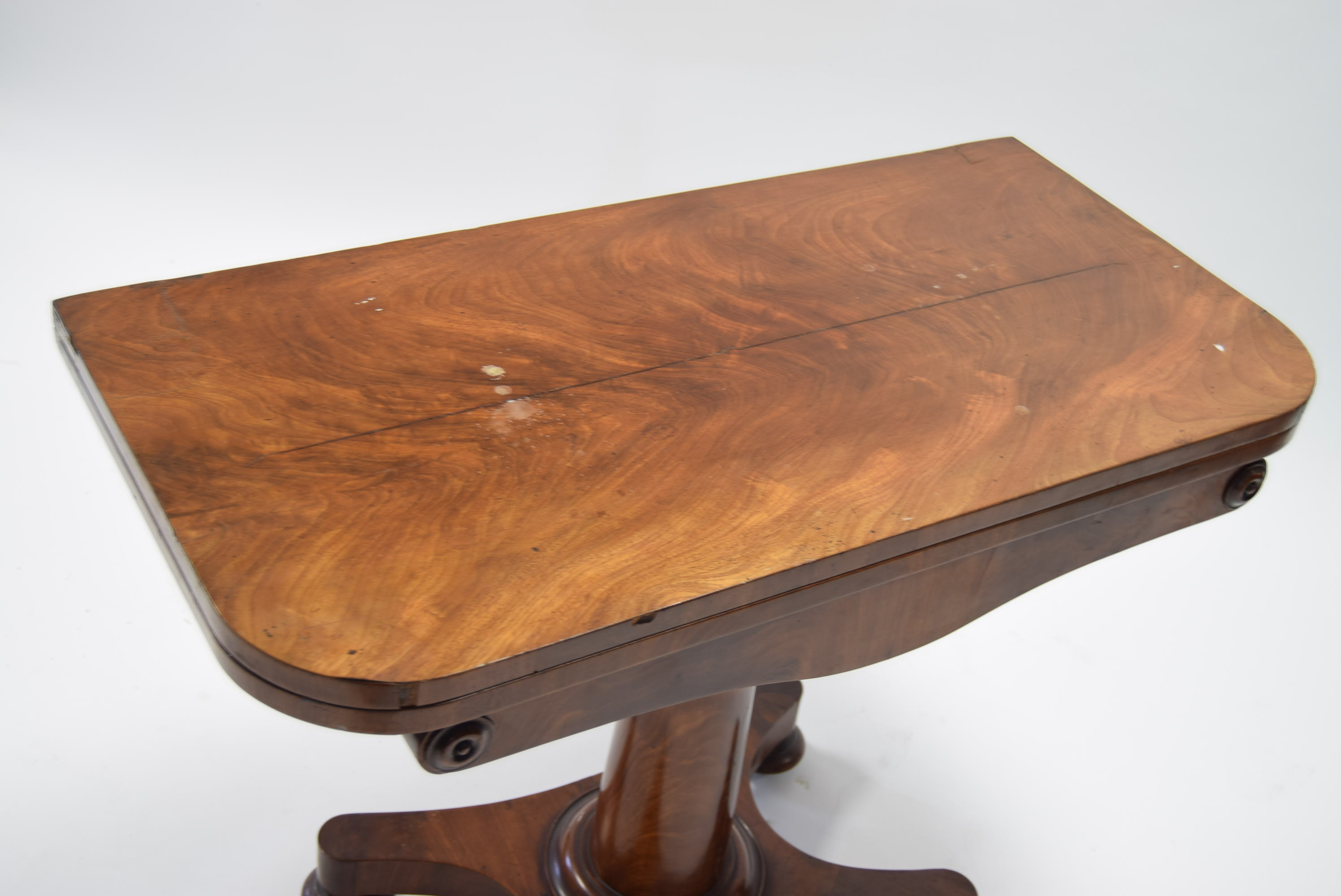 An early Victorian figured mahogany card table, the rectangular fold-over top inset circular pink - Image 2 of 4
