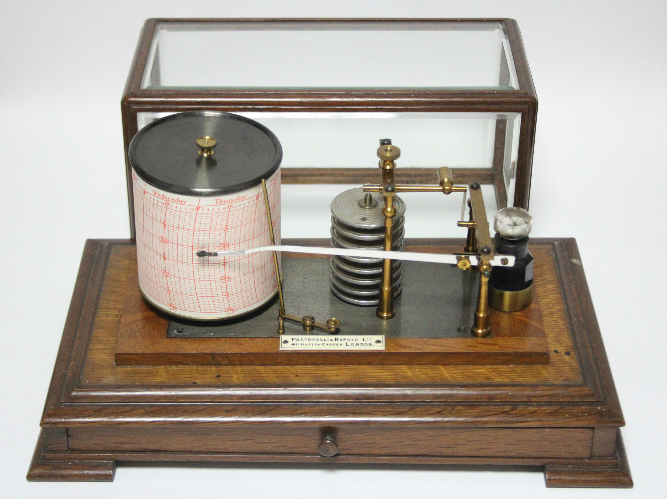 An early 20th century barograph by Pastorelli & Rapkin of Hatton Garden, in oak case with bevelled