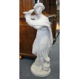 A white-painted plaster standing classical female figure with flowing robes, a candle holder to