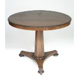 An early Victorian mahogany pedestal table, the circular top on octagonal tapered centre column &