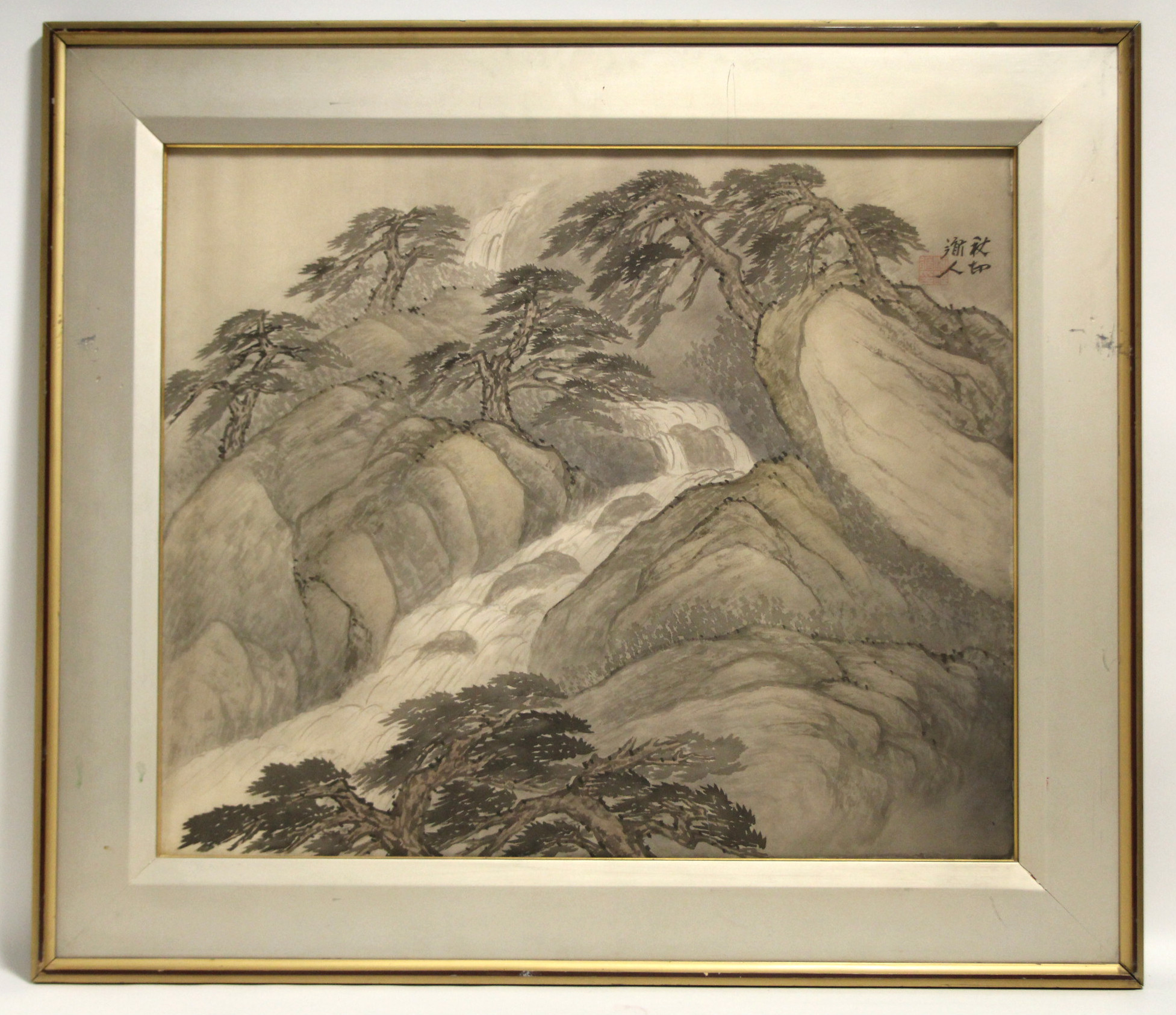 KONO, Shuson (Japanese, 1890-1987). A mountain stream with over-hanging pine trees. Watercolour on