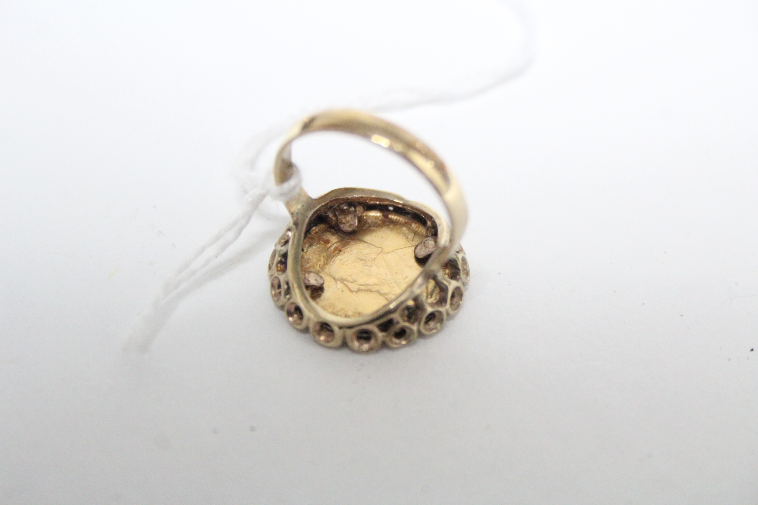 A South African 1981 one-tenth Krugerrand mounted in a 9ct. gold ring. - Image 3 of 3