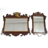 An 18th century-style rectangular wall mirror in mahogany fret-carved frame, 22½” x 20½”; & a
