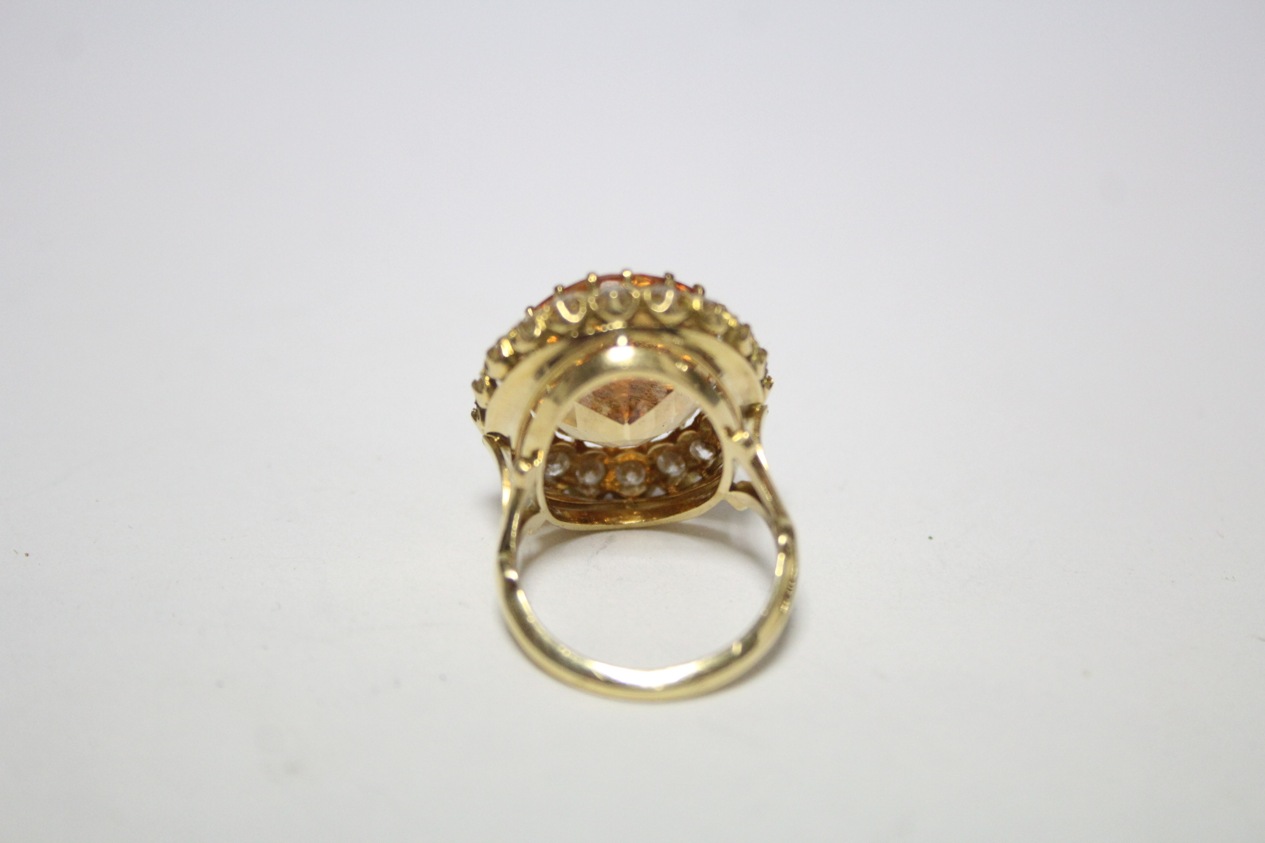 AN 18ct. GOLD, TOPAZ, & DIAMOND RING, the large oval topaz measuring approx. 19mm x 15mm, set within - Image 3 of 3