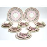 A 19th century Copeland porcelain tea service of pink ground with painted floral decoration in